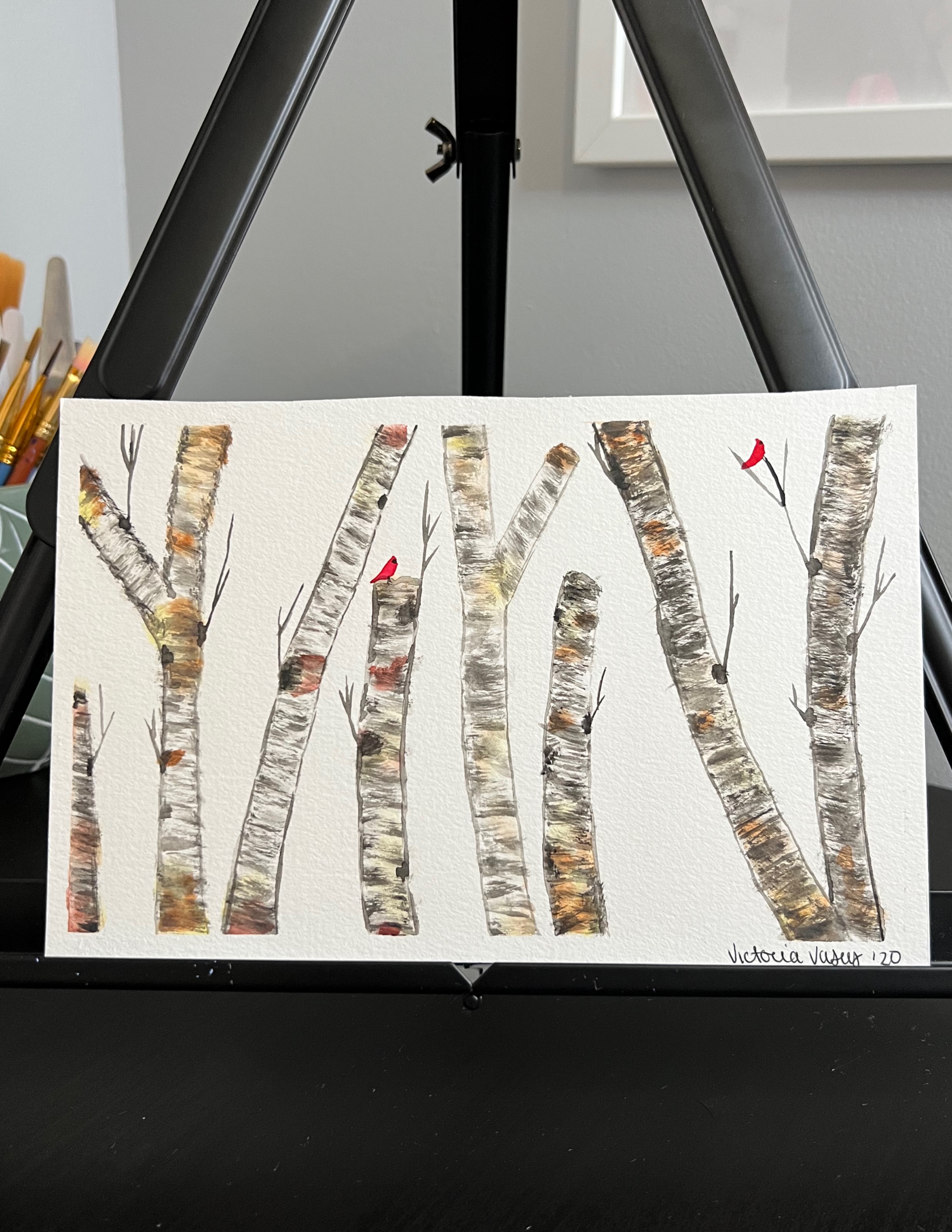 painting of birch trees with cardinals perched on branches 