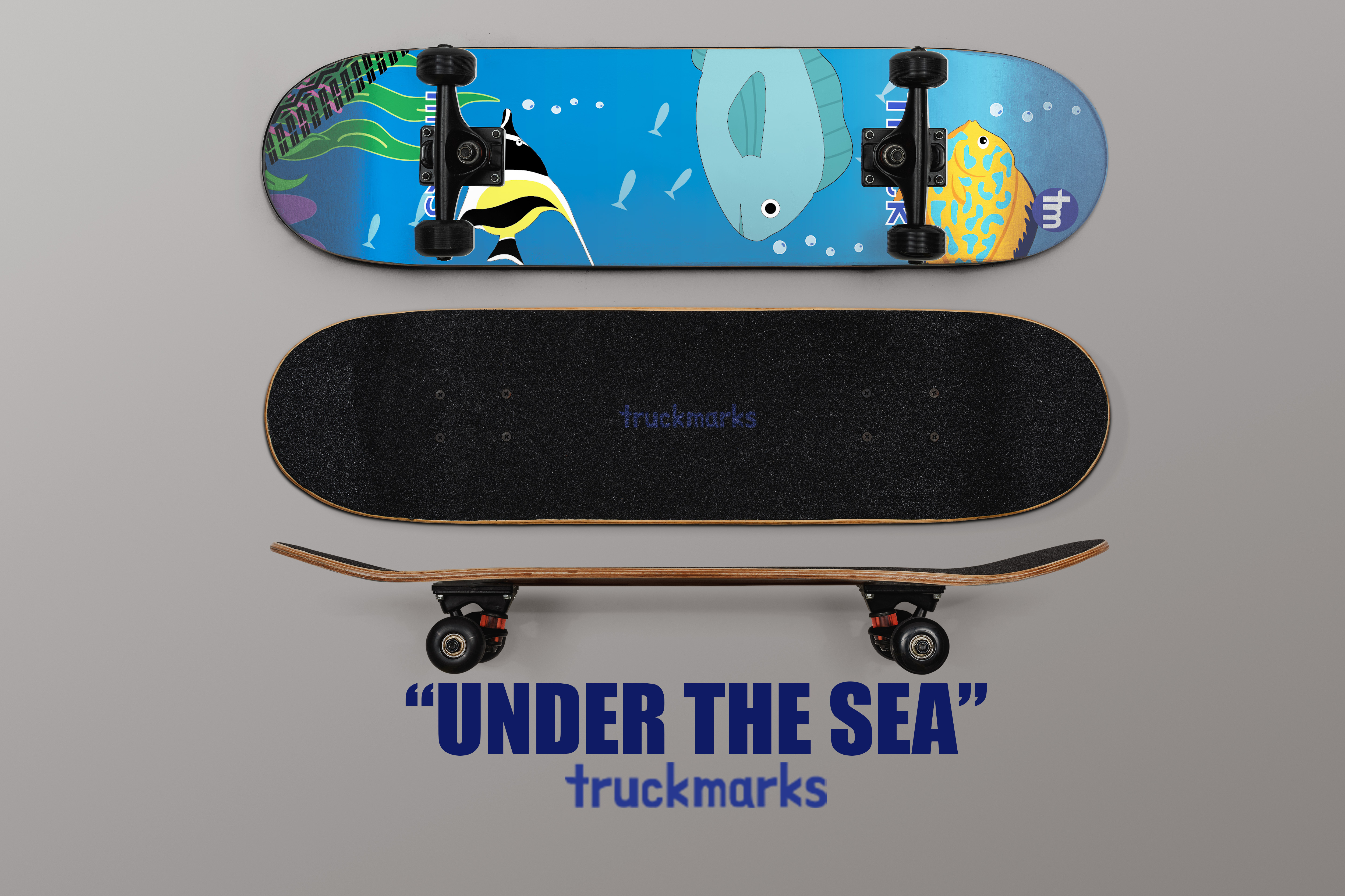 Skateboard mockup featuring colorful underwater sea life including fish and aquatic plants, shown from top, grip, and side views with trucks and wheels, labeled “Under the Sea” by Truckmarks.